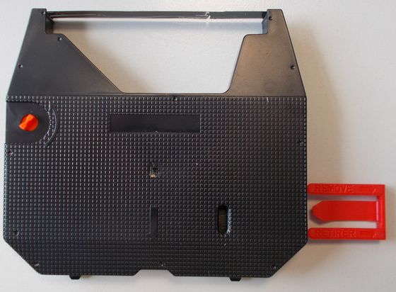 560px-Compatible_Brother_1030__Side_View___Tab_Off_.jpg