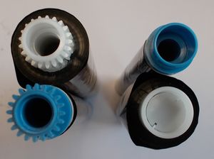 300px-Compatible_Panasonic_KXFA54X__Side_View_with_Cogs_+_Pins_On_.jpg